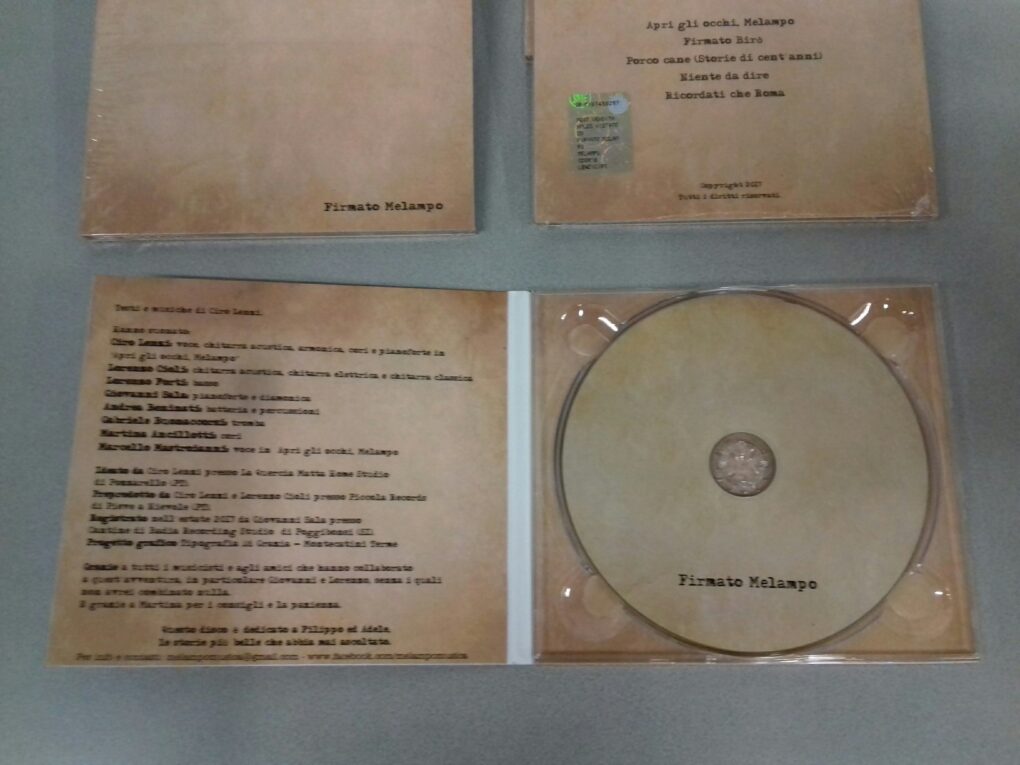 Duplicazione CD “Firmato Melampo” in digipack 2 ante lucido